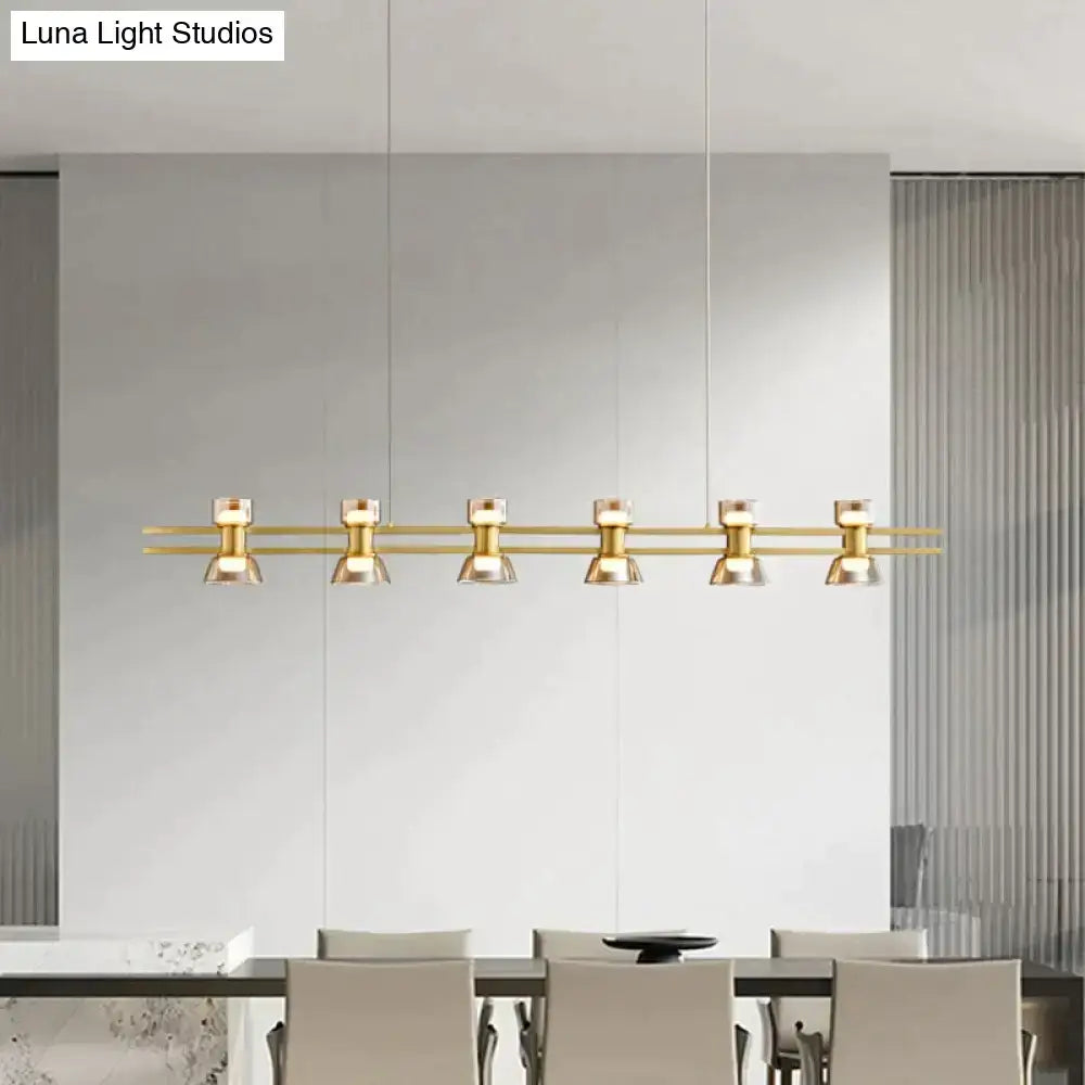 Gold-toned modern pendant led strip lamp with five clear glass shades and a sleek horizontal bar design for kitchen islands