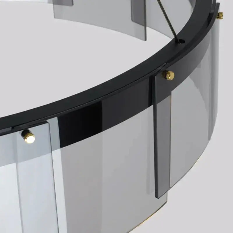 Modern black and clear glass circle led luxury chandelier with smoked glass panels and gold-toned hardware for kitchen island decorbites glass circle luxury chandelier