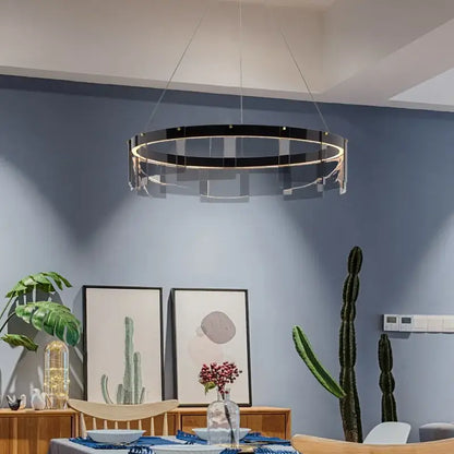 Modern black and clear glass circle led luxury chandelier with sleek acrylic design and illuminated inner ring for kitchen island decorbites glass circle