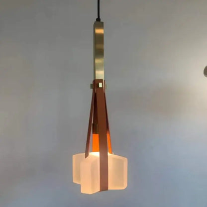 Modern pendant light with clear white resin frosted glass hexagonal shades and brass metal rod for kitchen lighting