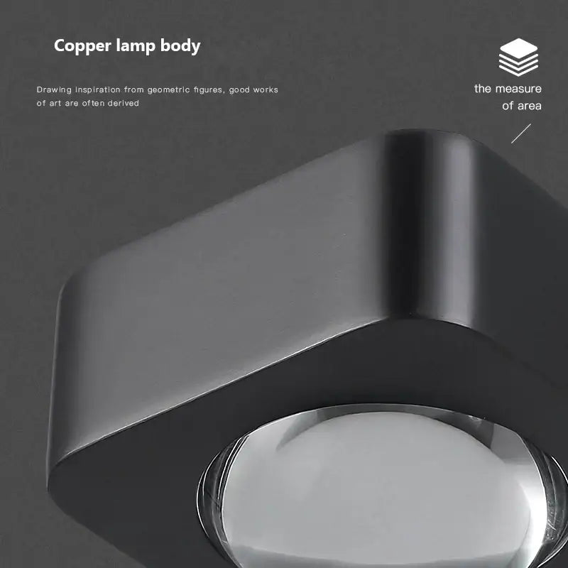 Modern black and copper bedroom wall lamp with geometric copper body and polished metallic finish for decorbites copper bedroom wall