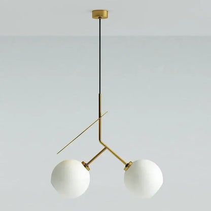 Modern black and crimson decorbites glass cherry pendant light featuring brass and frosted glass shades for dining room decor