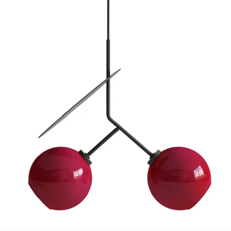 Modern black metal pendant light with two glossy crimson glass cherry pendant shades for dining room decorbites decor