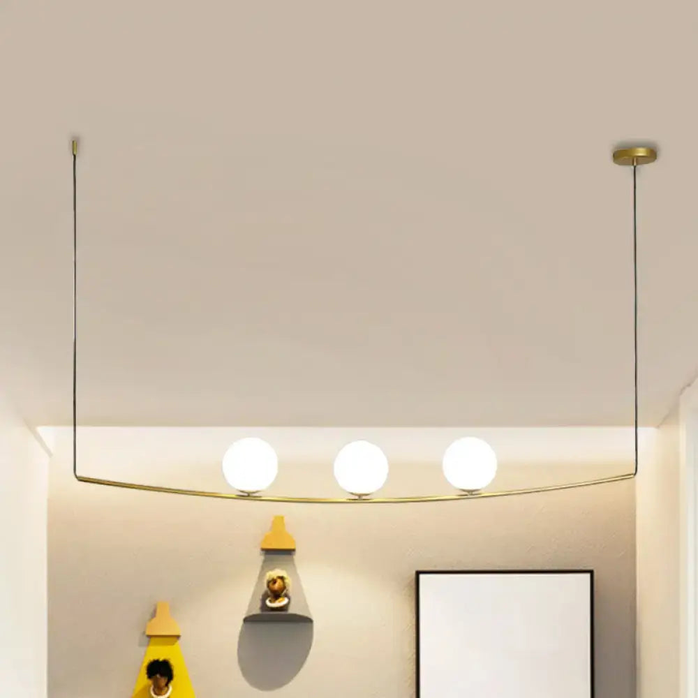 DecorBites modern metal chandelier with three frosted glass globes on black gold curved frame bubble island light