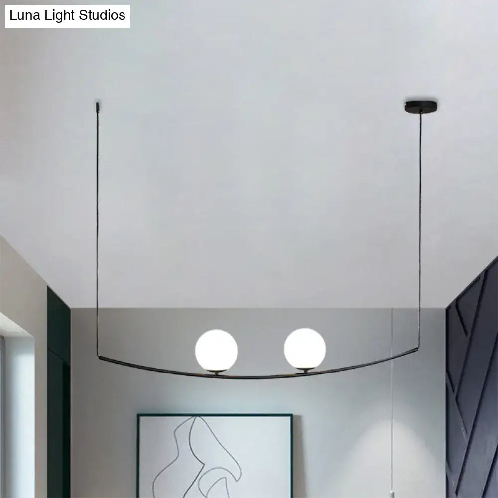 DecorBites™ modern black gold metal chandelier with two spherical glass bulbs in a stylish light bubble island design