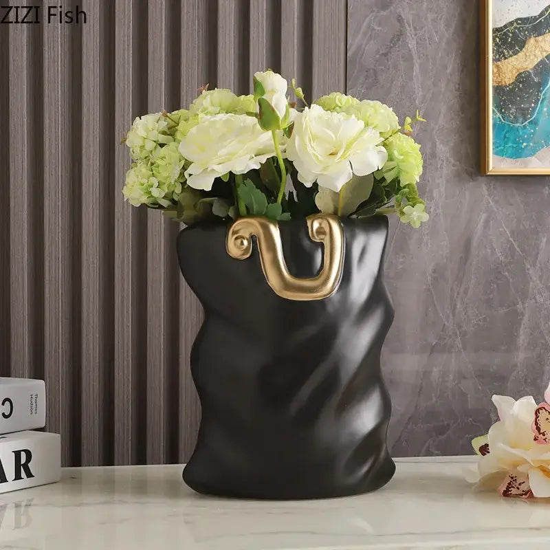 Modern black and gold ceramic bag vase by decorbites featuring a u-shaped handle for stylish living room decor