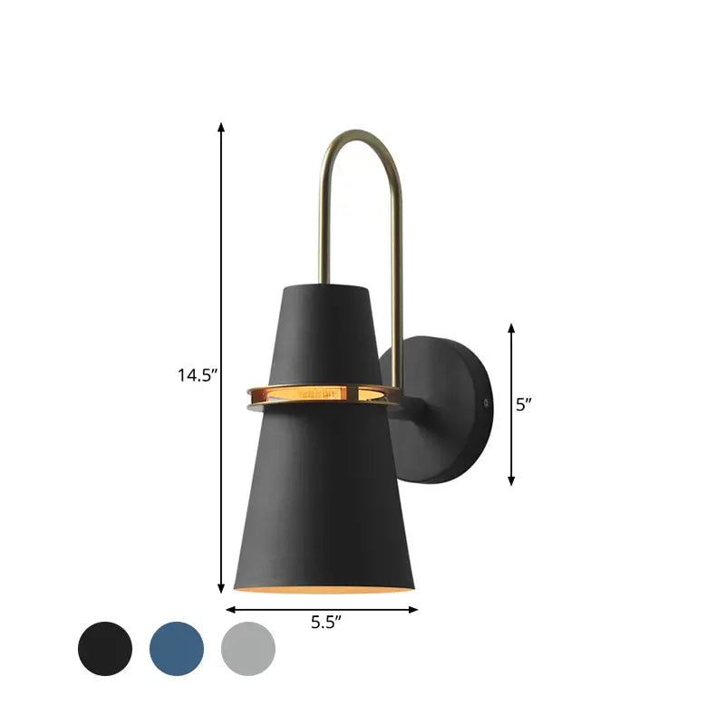 Modern black and gold conical sconce with matte black finish brass curved arm and circular backplate for dining room wall lamp