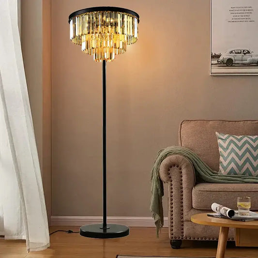 Modern black and gold crystal floor lamp with cascading tiers of golden glass elements for living room decor