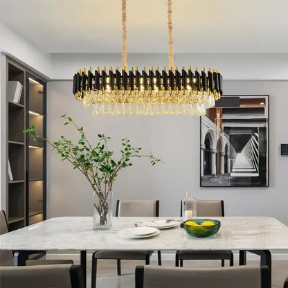 Modern black and gold decorbites crystal pendant chandelier with crystal droplets hanging from braided rope for dining room decor