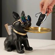 Modern black and gold decorbites bulldog statue with gold-rimmed sunglasses holding a key tray in its mouth