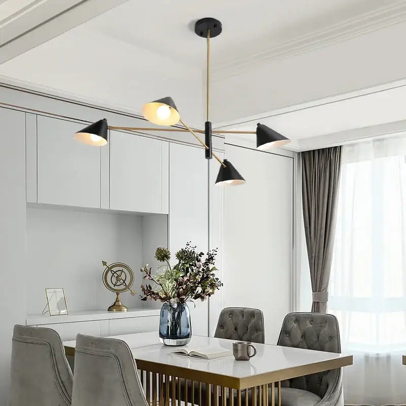 Modern black and brass decorbites cone shade chandelier with four angled lampshades for dining room lighting