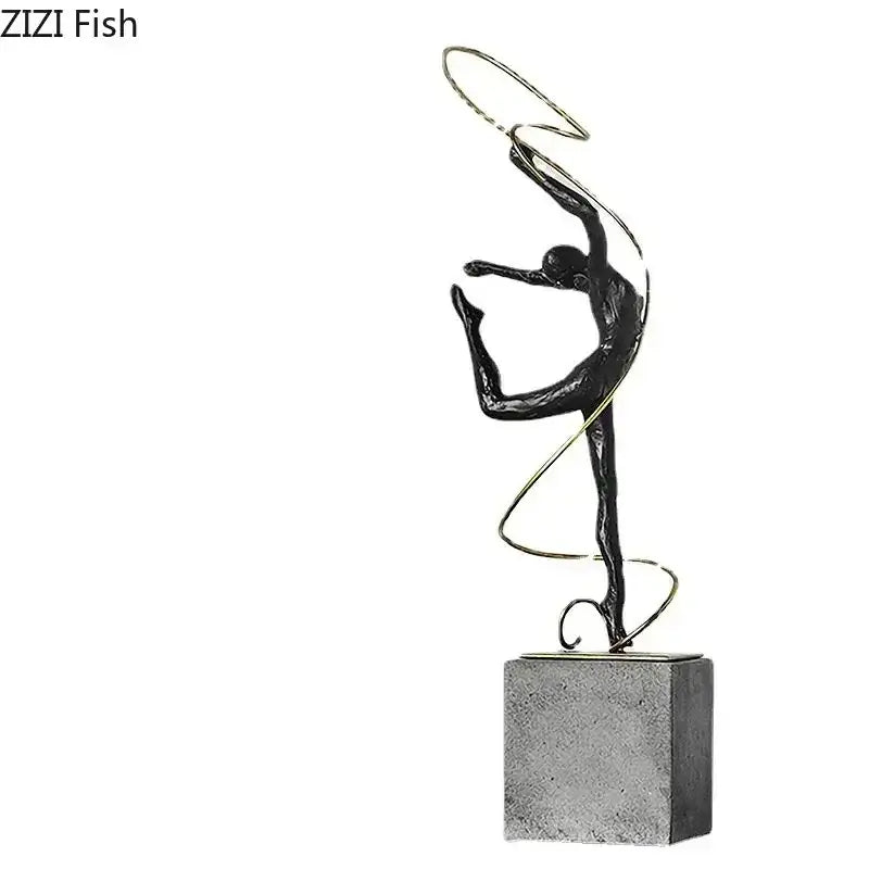 Modern black and gold wire decorbites gymnast figures statue of dancer in mid-leap on textured gray stone base