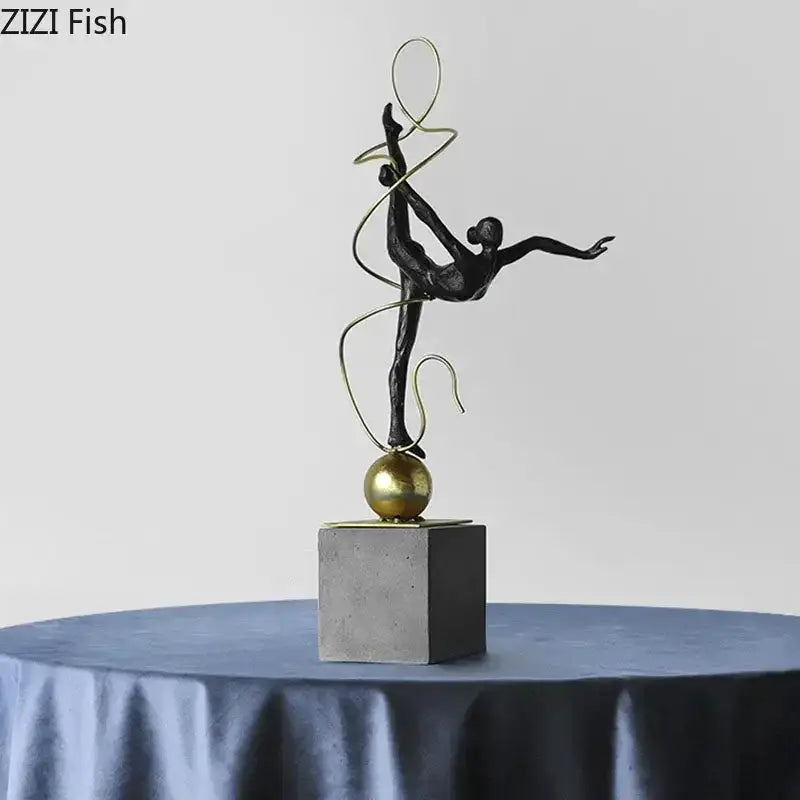 Modern black and gold decorbites gymnast figures statue of a dancer leaping on a golden sphere for living room decor