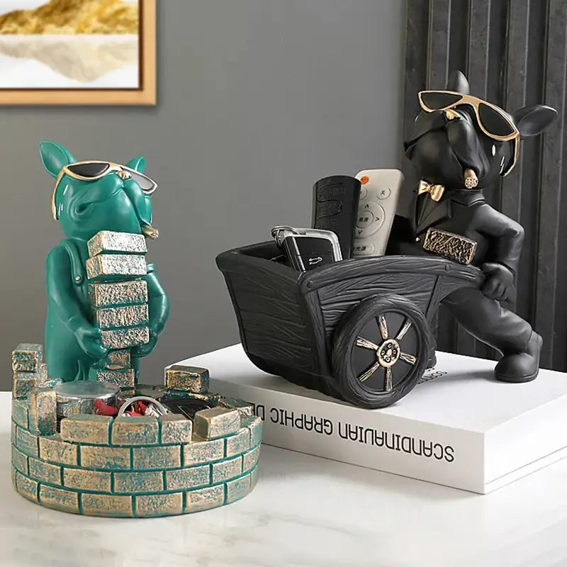 Teal and gold resin dog statue resin art featuring a bulldog wearing sunglasses carrying bricks for modern decorbites decor