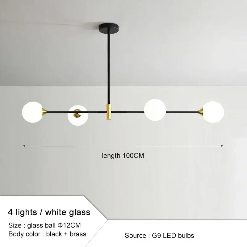 Modern black and gold glass ball pendant chandelier with four white glass spheres and brass frame for dining room decorbites glass ball