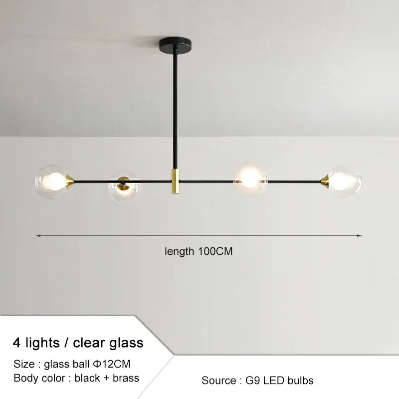 Modern black and gold glass ball pendant chandelier with four clear globe lights ideal for dining room decorbites glass ball