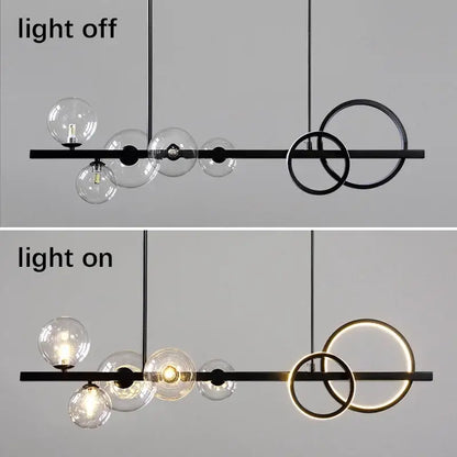 Modern black and gold glass ball pendant chandelier with clear glass globe bulbs and illuminated circular rings decorbites glass ball