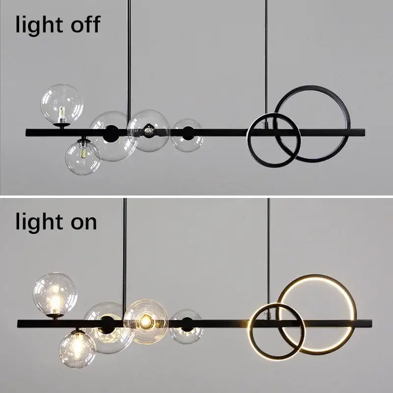Modern black and gold glass ball pendant chandelier with clear glass globe bulbs and illuminated circular rings decorbites glass ball
