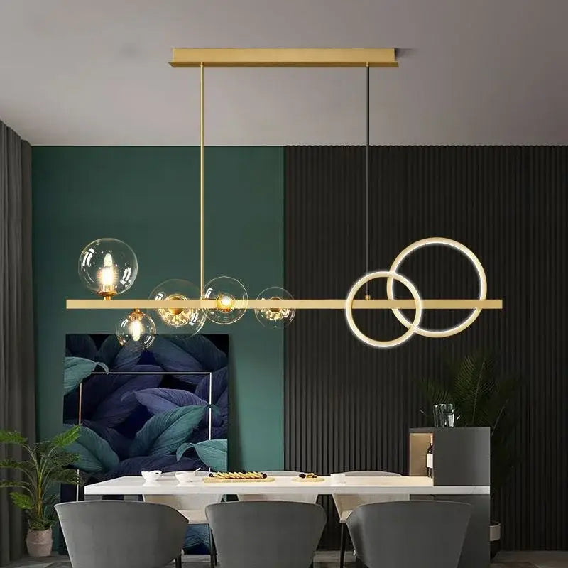 Modern black and gold glass ball pendant chandelier with clear glass globe bulbs and overlapping led rings decorbites glass ball