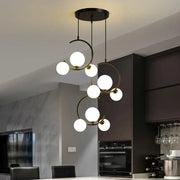 Modern black and gold glass ball pendant light with frosted globe bulbs for living room decorbites glass ball pendant