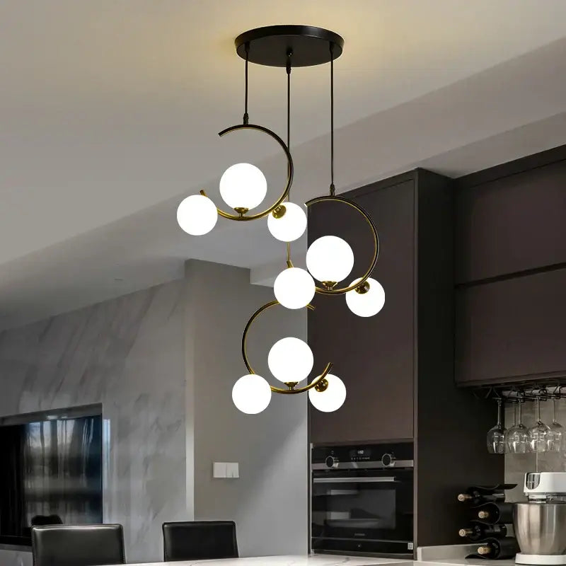 Modern black and gold glass ball pendant light with frosted globe bulbs for living room decorbites glass ball pendant