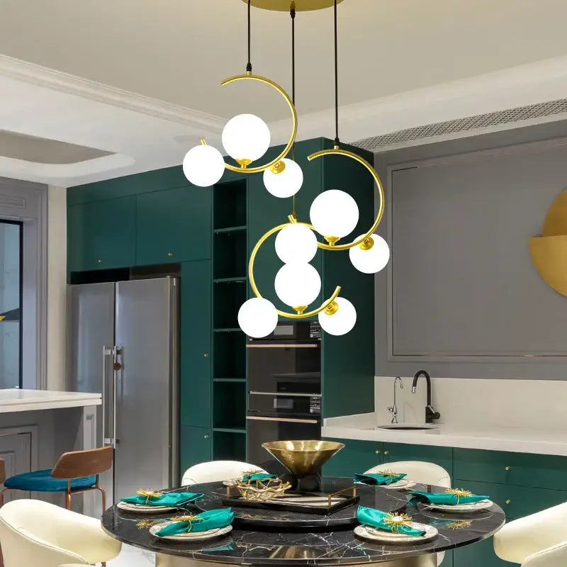 Modern black and gold glass ball pendant light featuring gold-toned spherical glass bulbs in an abstract design for living room decorbites glass ball pendant