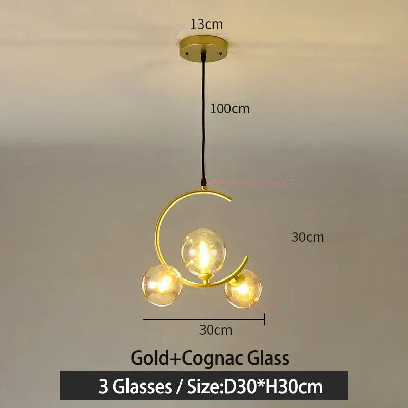 Modern black and gold glass ball pendant light with three spherical cognac glass bulbs for living room decorbites pendant light