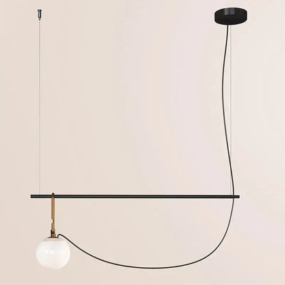 Modern black and brass glass ball pendant light with spherical white glass bulb for dining room decorbites pendant lights