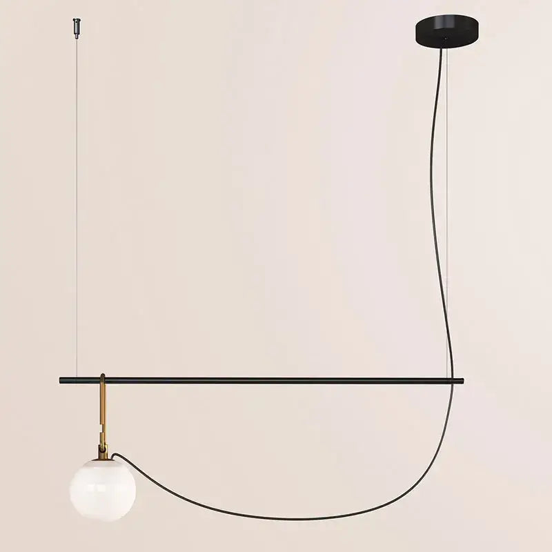 Modern black and brass glass ball pendant light with spherical white glass bulb for dining room decorbites pendant lights