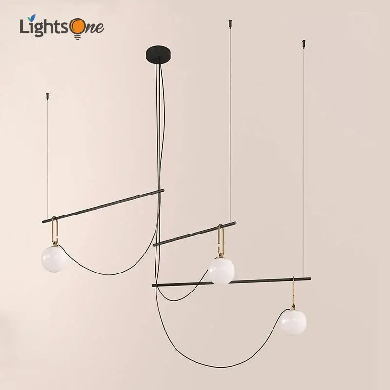 Modern black and gold glass ball pendant lights with three white glass globes for dining room decorbites chandelier