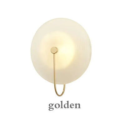 A sleek modern black and gold glass stripe wall lamp with frosted glass shade for bedroom decorbites wall sconce