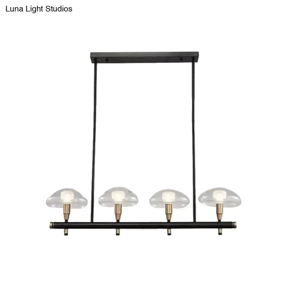 DecorBites black metal pendant light with four clear mushroom glass shades and brass accents ideal for restaurants