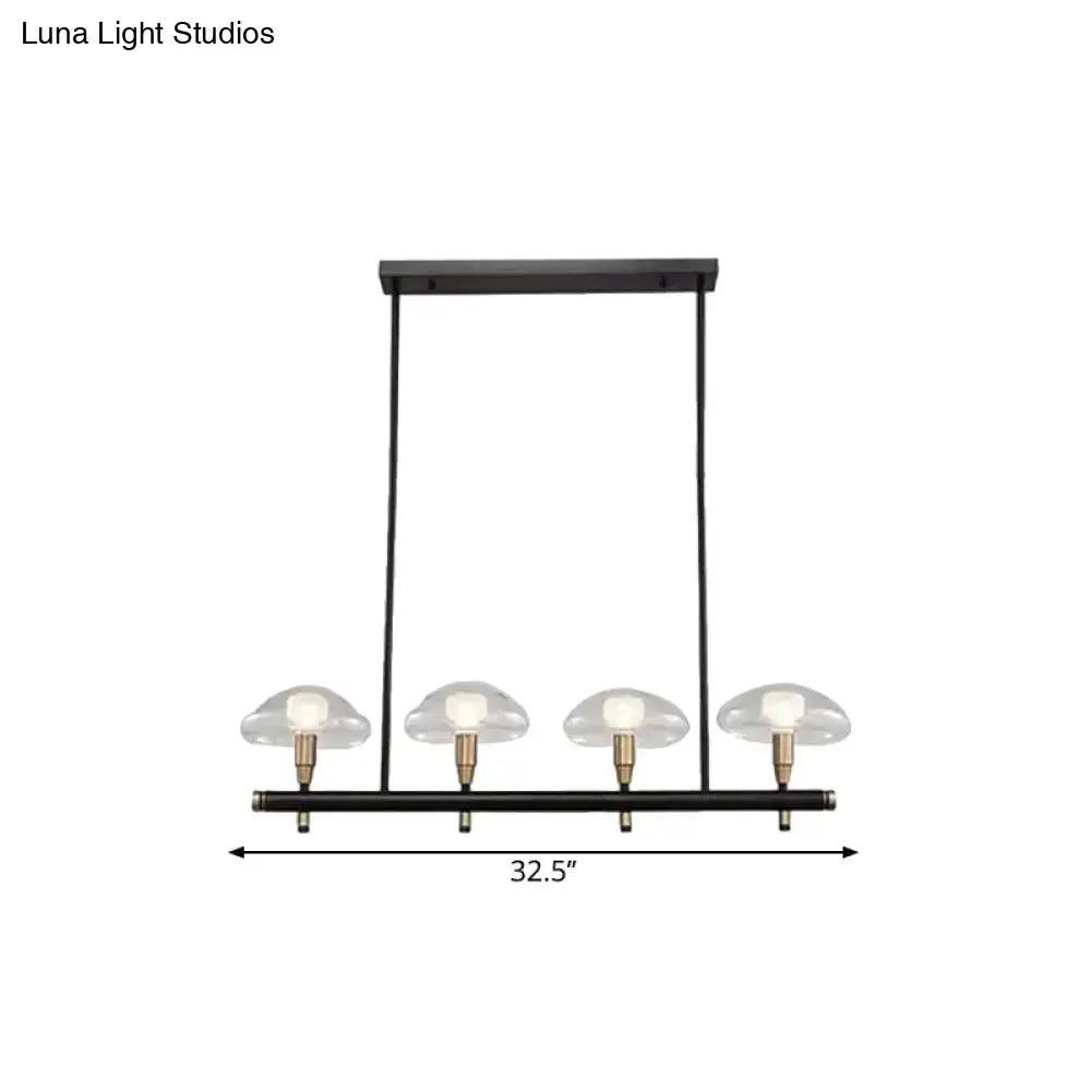 DecorBites™ black metal pendant light with four clear glass shades and brass accents ideal for restaurants