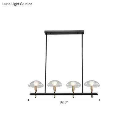 DecorBites™ black metal pendant light with four clear glass shades and brass accents ideal for restaurants