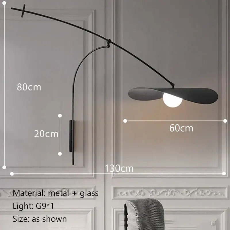 Modern black and gold leaf led wall lamp with black metal curved arm and glass shade for bedroom lighting