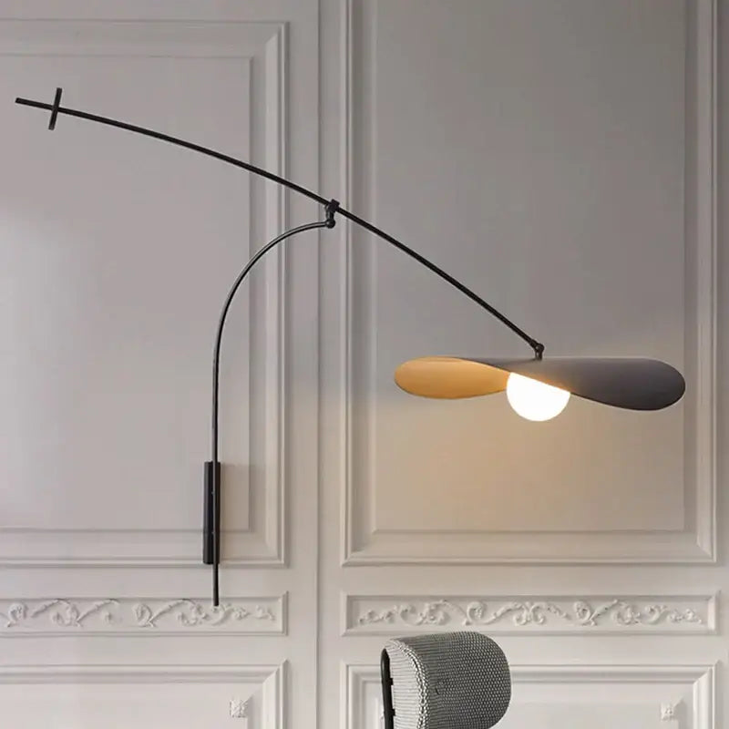Modern black led wall lamp with dual-toned leaf-shaped glass shade in matte gray and warm wood finish for bedroom