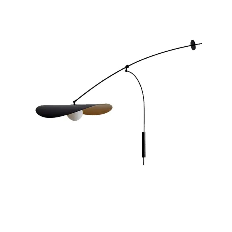 Modern black and gold leaf led wall lamp with glass shade and sleek curved arm for bedroom lighting