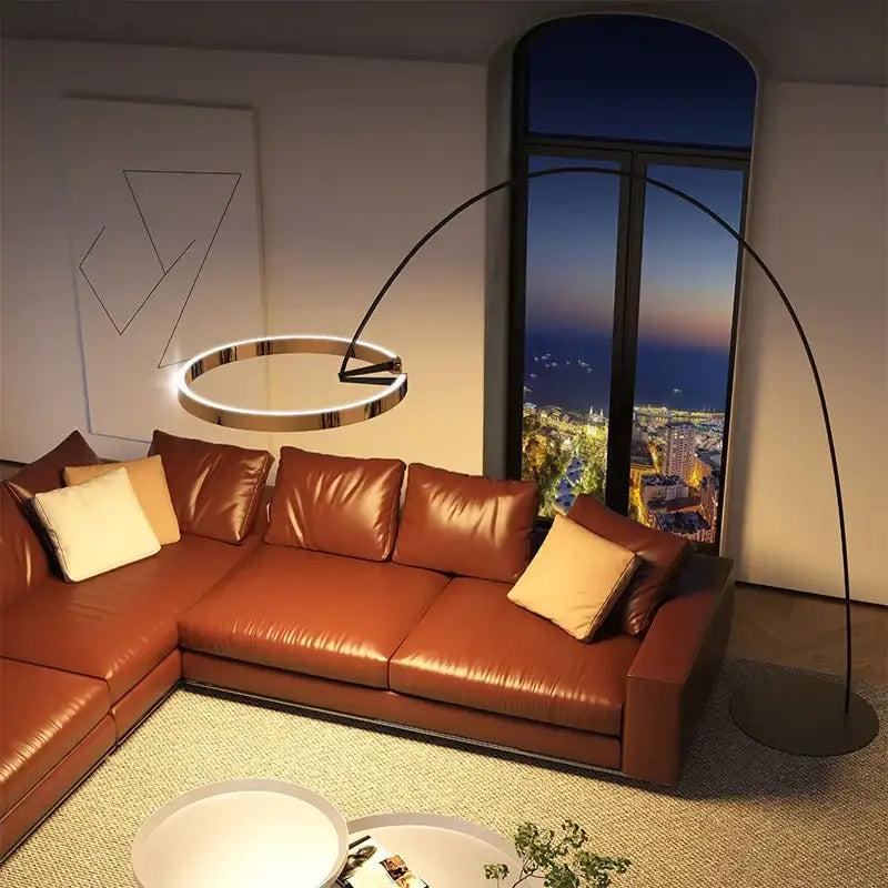 Modern black and gold led floor lamp with sleek arched black metal frame and circular ring led floor light fixture for living room