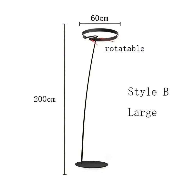 Modern black and gold led floor lamp with circular head and slender curved metal base for living room lighting