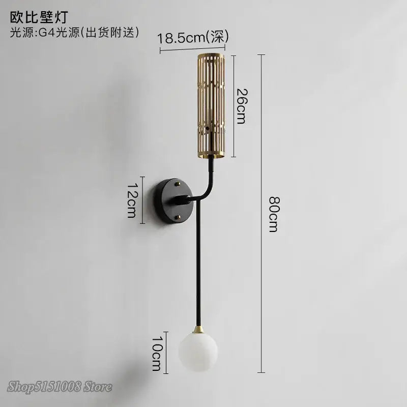 Modern brass and black wall lamp with cylindrical slatted fixture and white glass globe for decorbites led wall lamp