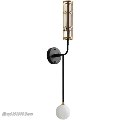 Modern black and gold led wall lamp with metal base and frosted glass bulb perfect for decorbites led wall lighting