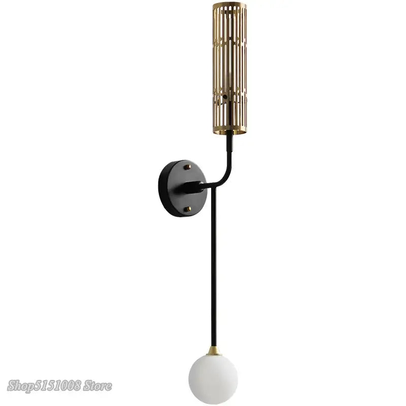Modern black and gold led wall lamp with metal base and frosted glass bulb perfect for decorbites led wall lighting