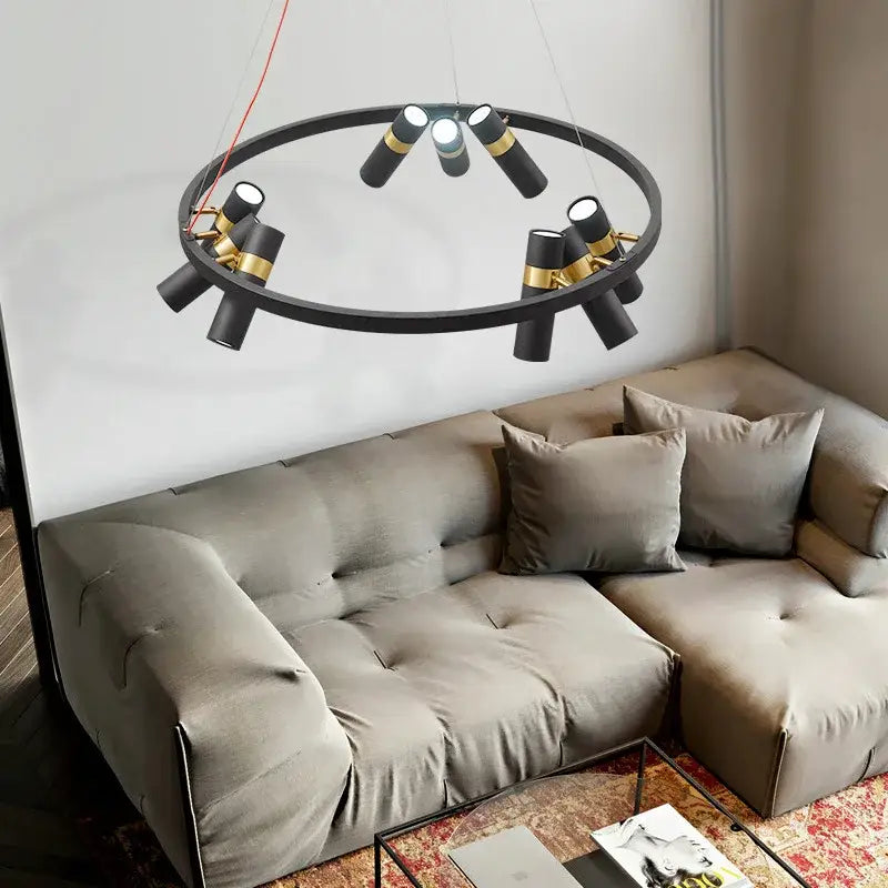 Modern black and gold ring led pendant light featuring cylindrical fixtures for stylish living room decorbites black ring design