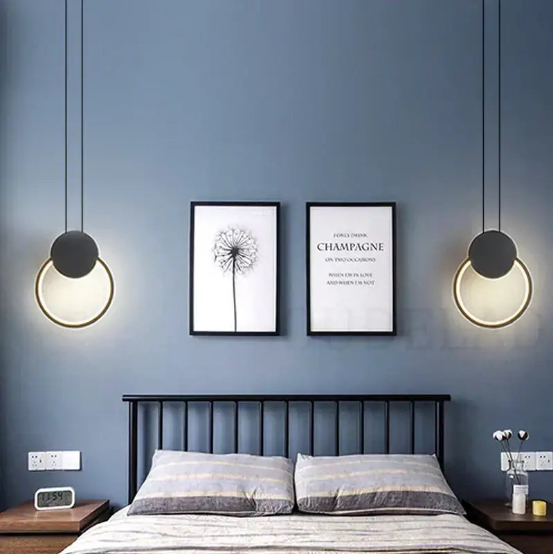 Modern black and gold ring pendant lamp with circular gold-rimmed rings for dining room decorbites black ring pendant