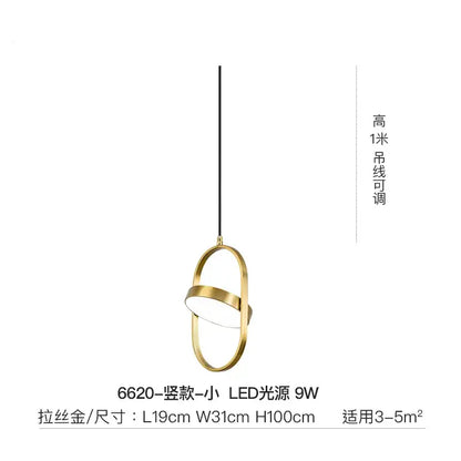 A modern black and gold trumpet pendant light with brushed gold finish and oval intersecting rings for dining room decorbites gold trumpet