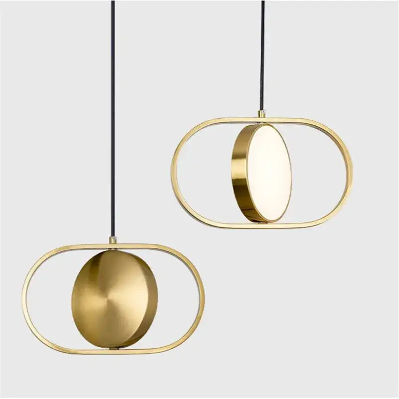 Modern black and gold trumpet pendant light with gold-toned oval panels and sleek metallic frame for dining room decorbites gold trumpet