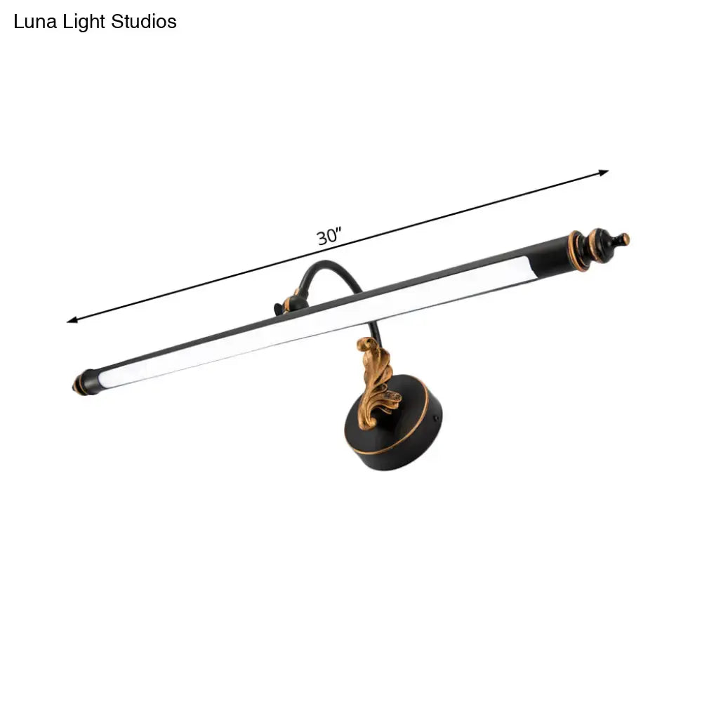 Modern black and gold ornate 30-inch tubular led wall light with decorative sculpted base for bathroom sconce use