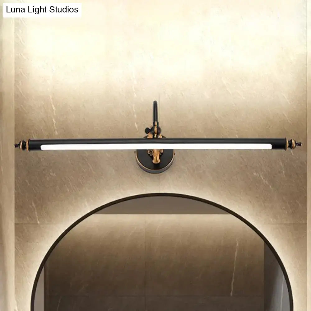 Modern black and gold tubular led wall light with ornate design mounted for bathroom sconce lighting