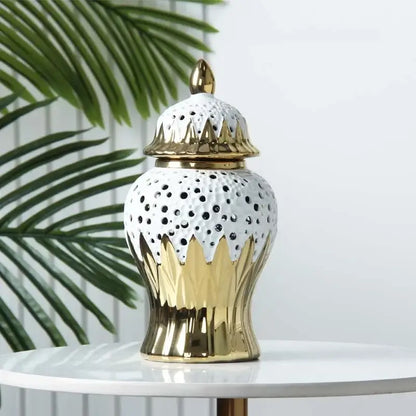 White ceramic porcelain jar with golden accents and black dot detailing for modern living room decor