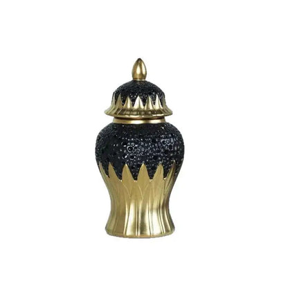 Modern black and golden porcelain jar with textured pebbled surface and brass accents for living room honeycomb decor